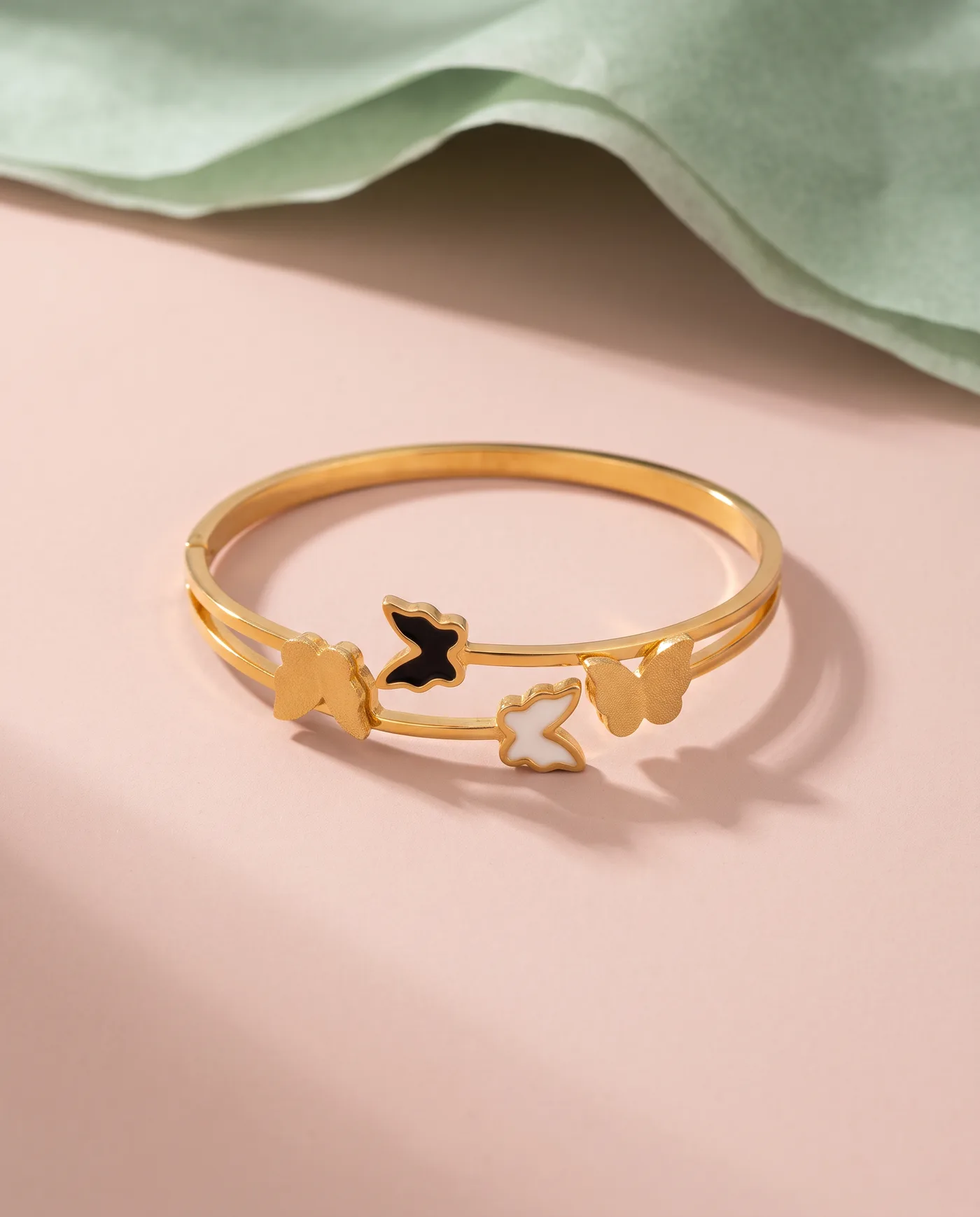 Butterfly Duo Bangle: Black, white and brushed-gold butterflies