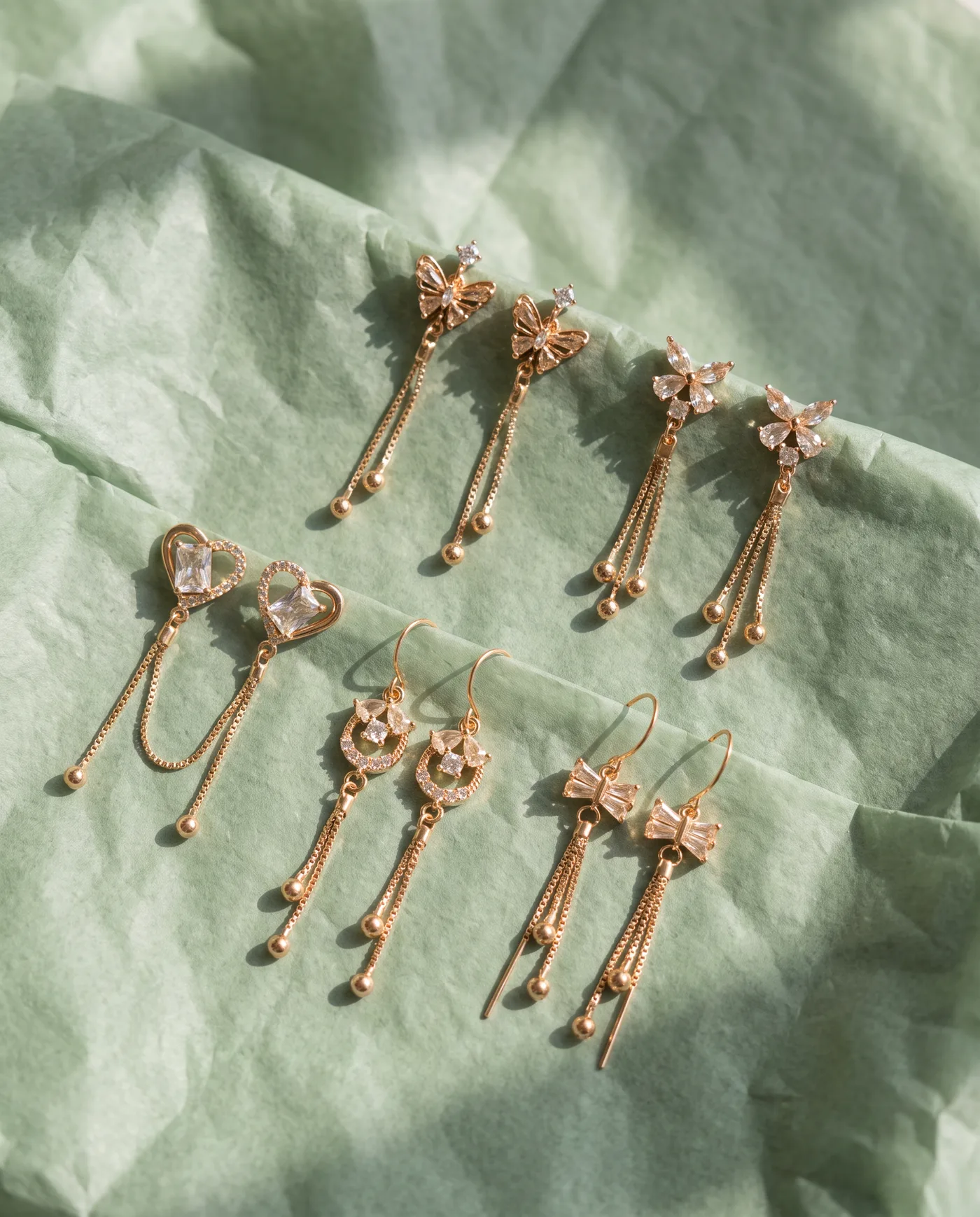 Tassel Charm Earrings: Crystal charms on fine chain tassels